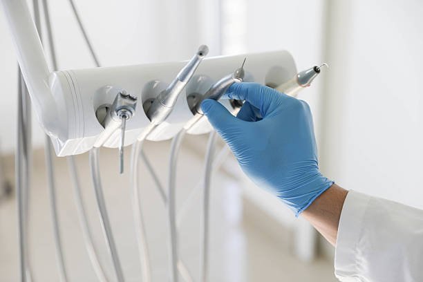 Professional Tooth Extraction technician working in Vicksburg, MI